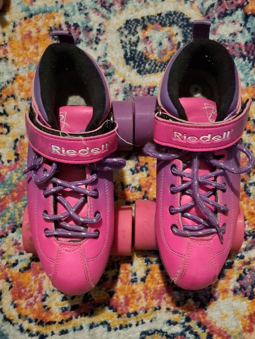 Riedell Dart Pink and Purple Kids Quad Roller Skates